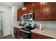 Modern kitchen with stainless steel appliances and an island at 386 Cotton Brook Dr, Fuquay Varina, NC 27526