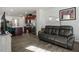 Open concept living room with kitchen view and seating at 386 Cotton Brook Dr, Fuquay Varina, NC 27526