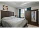 Main bedroom with large bed, dresser, and mirrored wardrobe at 386 Cotton Brook Dr, Fuquay Varina, NC 27526