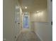 Hallway with carpet flooring, neutral walls, white doors and trim, and recessed lighting at 494 Traditions Grande Blvd # 25, Wake Forest, NC 27587
