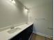 Bathroom featuring double sinks and granite countertop at 496 Traditions Grande Blvd # 24, Wake Forest, NC 27587