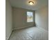 Bedroom with a window at 496 Traditions Grande Blvd # 24, Wake Forest, NC 27587