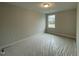 Bedroom with a window at 496 Traditions Grande Blvd # 24, Wake Forest, NC 27587