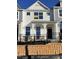 Charming exterior of newly constructed townhome featuring modern design elements and available signage at 496 Traditions Grande Blvd # 24, Wake Forest, NC 27587