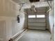 Unfinished garage with a garage door, drywall and electrical box at 496 Traditions Grande Blvd # 24, Wake Forest, NC 27587
