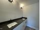 New bathroom featuring double vanity, undermount sinks and dark hardware at 498 Traditions Grande Blvd # 23, Wake Forest, NC 27587