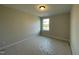 Unfurnished bedroom showcasing neutral walls, window, and natural light at 498 Traditions Grande Blvd # 23, Wake Forest, NC 27587