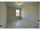Well-lit bedroom with a view, offering a blank canvas for personalization and comfort at 498 Traditions Grande Blvd # 23, Wake Forest, NC 27587