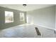 A light-filled bedroom with two windows, offering a serene space ready for personalization and comfort at 498 Traditions Grande Blvd # 23, Wake Forest, NC 27587
