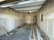 Unfinished garage space ready for customization and storage at 498 Traditions Grande Blvd # 23, Wake Forest, NC 27587