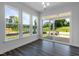 Bright living room with hardwood floors, recessed lighting, and a sliding glass door at 500 Traditions Grande Blvd # 22, Wake Forest, NC 27587