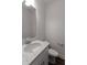 Powder room with a single sink vanity with granite countertop at 500 Traditions Grande Blvd # 22, Wake Forest, NC 27587