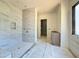 New bathroom featuring a tiled shower with seat, vanity, and a window at 7013 Buckhead Dr, Raleigh, NC 27615