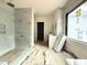 Bathroom featuring a frameless glass shower and modern fixtures at 7013 Buckhead Dr, Raleigh, NC 27615