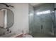 Stylish bathroom featuring a glass shower, tiled walls, and modern fixtures for a clean aesthetic at 7013 Buckhead Dr, Raleigh, NC 27615