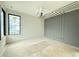 Bedroom featuring decorative gray wall at 7013 Buckhead Dr, Raleigh, NC 27615