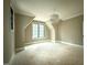Cozy bedroom featuring an overhead light fixture and multiple windows at 7013 Buckhead Dr, Raleigh, NC 27615
