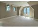 Unfinished bedroom featuring multiple windows offering natural light, and neutral paint at 7013 Buckhead Dr, Raleigh, NC 27615
