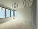 Bedroom featuring decorative gray wall and large windows at 7013 Buckhead Dr, Raleigh, NC 27615
