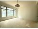 Spacious living room with large windows offering ample natural light at 7013 Buckhead Dr, Raleigh, NC 27615