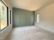New room with arched wall panels and multiple windows at 7013 Buckhead Dr, Raleigh, NC 27615
