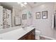 Clean bathroom with vanity, toilet, shower, and decorative accents at 891 Cupola Dr, Raleigh, NC 27603