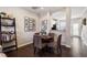 Cozy dining area with round table and wicker chairs at 891 Cupola Dr, Raleigh, NC 27603