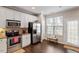 Kitchen boasts stainless steel appliances and ample cabinet space at 891 Cupola Dr, Raleigh, NC 27603