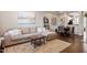 Spacious living room with hardwood floors and comfy seating at 891 Cupola Dr, Raleigh, NC 27603