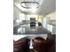 Modern kitchen with white cabinets, stainless steel appliances, and black countertops at 9201 Sayornis Ct, Raleigh, NC 27615