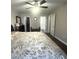 Comfortable bedroom featuring hardwood floors, a ceiling fan, and generous closet space at 9201 Sayornis Ct, Raleigh, NC 27615