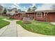 House exterior showcasing a large deck and a well-manicured lawn at 1009 Deboy St, Raleigh, NC 27606