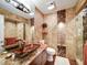 Spa-like bathroom with granite vanity, large shower, and decorative tile at 1009 Deboy St, Raleigh, NC 27606