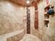 Elegant bathroom with a large walk-in shower and built-in shelving at 1009 Deboy St, Raleigh, NC 27606