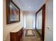 Bright entryway with hardwood floors, large mirror, and decorative console table at 1009 Deboy St, Raleigh, NC 27606