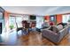 Open living room and dining area with hardwood floors and lots of natural light at 1009 Deboy St, Raleigh, NC 27606