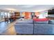 Living room with sectional sofa and hardwood floors at 1009 Deboy St, Raleigh, NC 27606