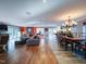 Open concept living and dining area with hardwood floors at 1009 Deboy St, Raleigh, NC 27606