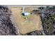 Aerial view of house and surrounding land at 1100 Ben Smith Road Rd, Siler City, NC 27344