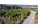 Aerial view of a wooded lot near a road at 1100 Ben Smith Road Rd, Siler City, NC 27344