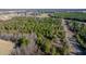 Aerial photo of land with lush green trees at 1100 Ben Smith Road Rd, Siler City, NC 27344