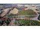 Aerial view of property with lot lines and wooded area at 1100 Ben Smith Road Rd, Siler City, NC 27344
