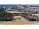 Property features a house, large yard, and surrounding woodlands at 1100 Ben Smith Road Rd, Siler City, NC 27344