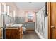 Clean bathroom with a shower/tub combo and vintage details at 1100 Ben Smith Road Rd, Siler City, NC 27344