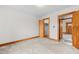 Spacious bedroom with wood floors and access to another room at 1100 Ben Smith Road Rd, Siler City, NC 27344