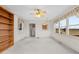 Bright dining room with built in shelving and carpet at 1100 Ben Smith Road Rd, Siler City, NC 27344