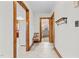 Hallway with wood trim and doors to other rooms at 1100 Ben Smith Road Rd, Siler City, NC 27344