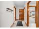 View down hallway showcasing access to other rooms at 1100 Ben Smith Road Rd, Siler City, NC 27344