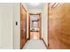 Hallway with doors leading to bedrooms and other rooms at 1100 Ben Smith Road Rd, Siler City, NC 27344
