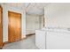 Clean laundry room with washer, dryer, and storage at 1100 Ben Smith Road Rd, Siler City, NC 27344